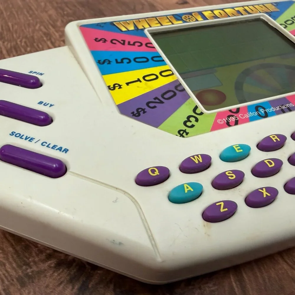Vintage Wheel of Fortune Tiger Electronics Handheld Game 1995